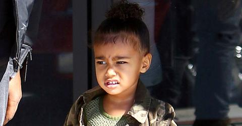 Kanye West picks up North West from dance as she’s wearing a jacket from his clothing line