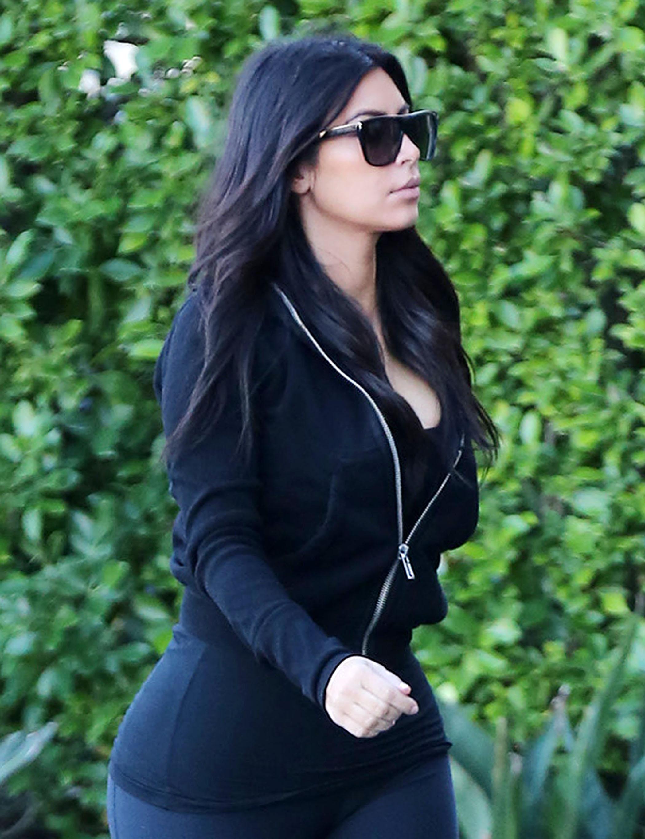 Kim Kardashian and Khloe Kardashian seen leaving their office in Woodland Hills ***NO DAILY MAIL SALES***