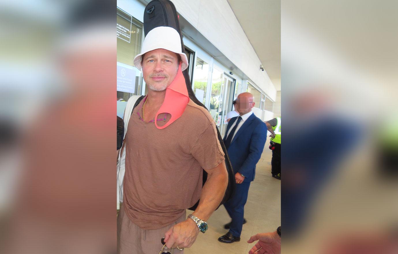 brad pitt spotted at airport