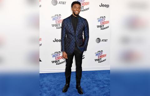 A Look Back At Chadwick Boseman's Best Red Carpet Looks