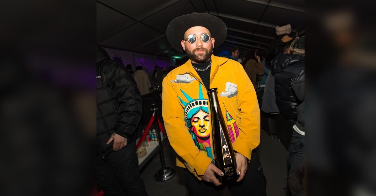 singer songwriter parson james celebrates with tequila don julio  during palm tree music festival in aspen co