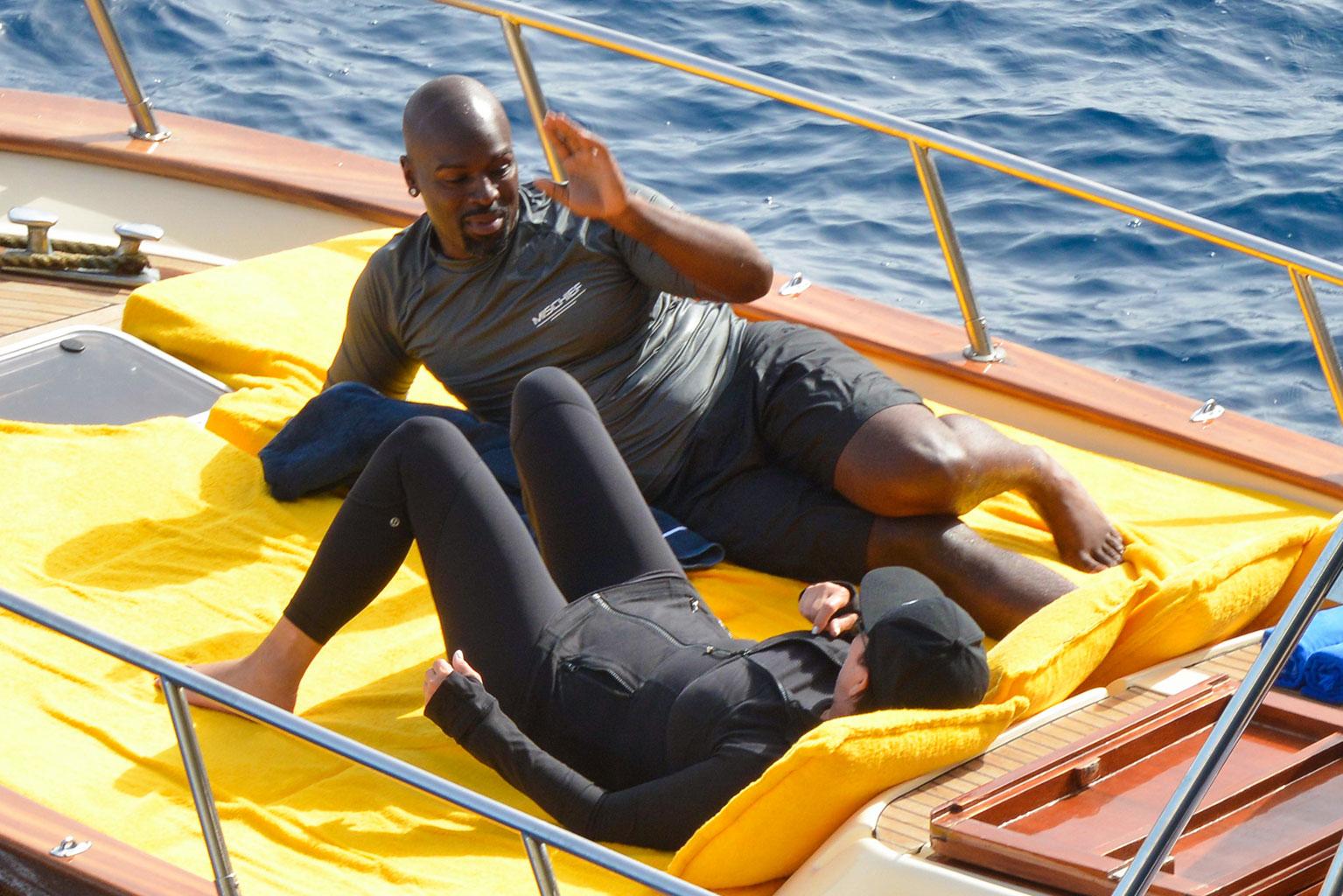 *PREMIUM EXCLUSIVE* Kris Jenner and Corey Gamble cozy up on a boat in Italy