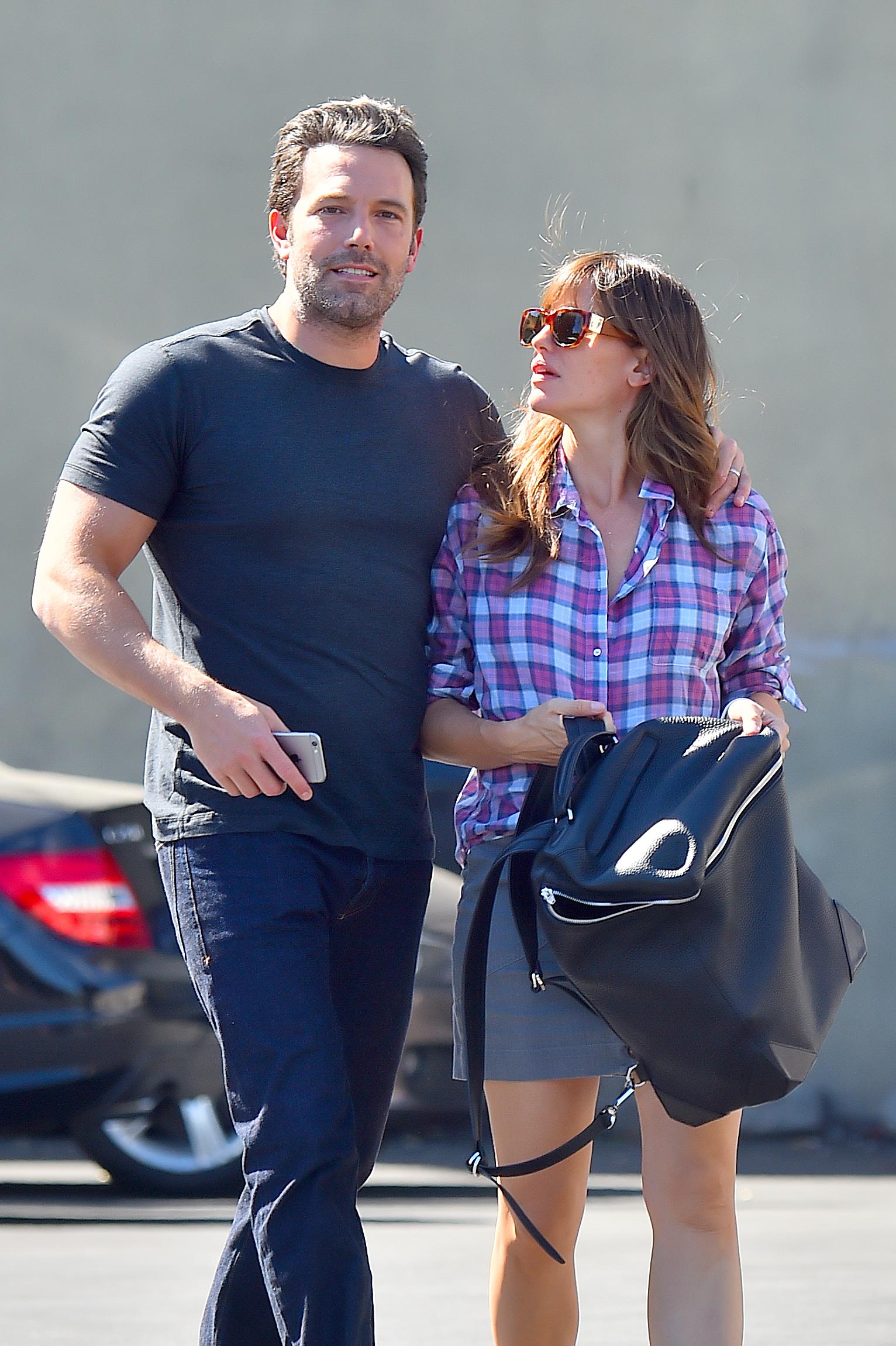 Ben Affleck is affectionate with his wife Jennifer Garner as they walk to lunch together in Brentwood