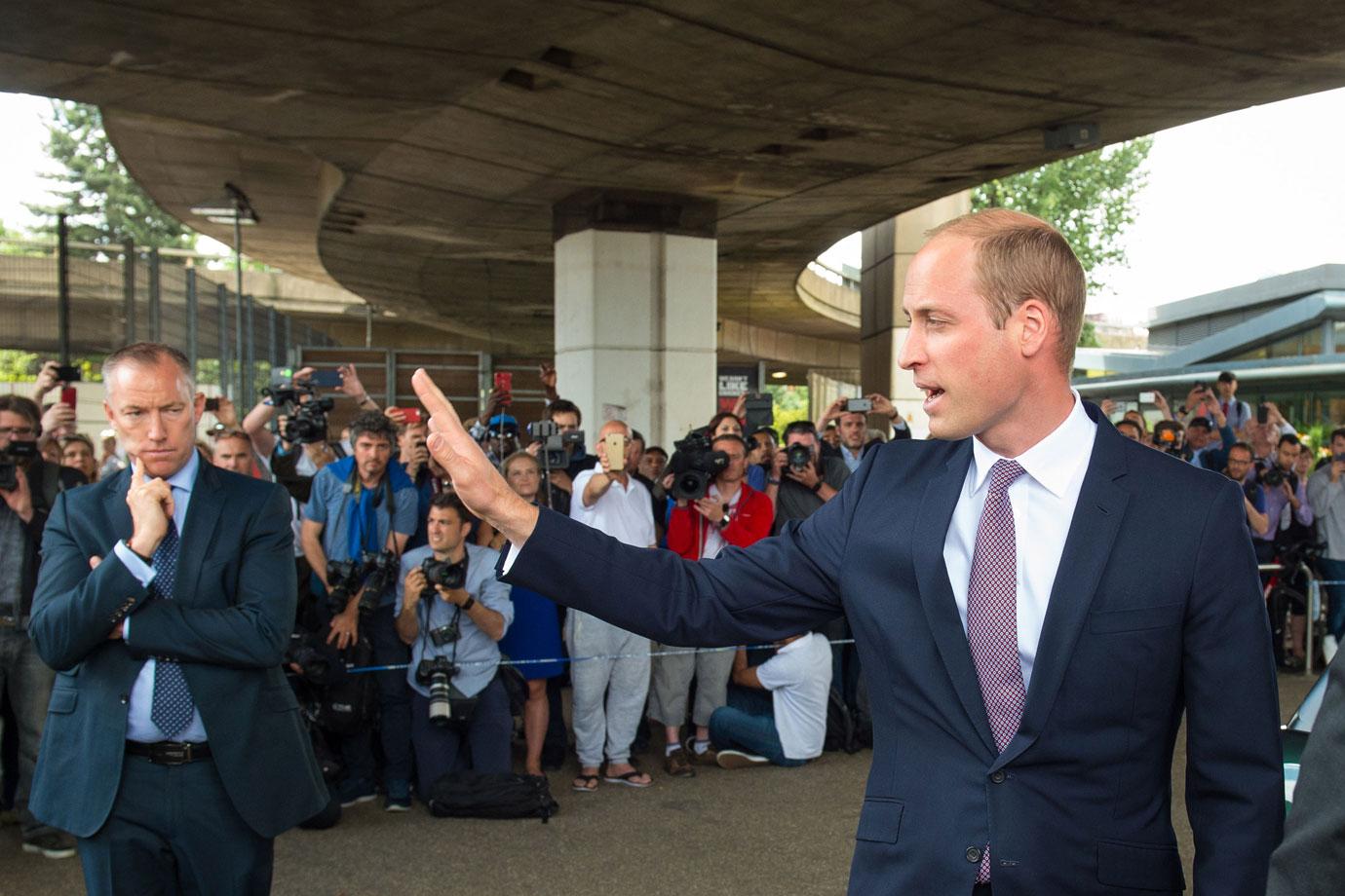 Prince William Hugs Victim London Fire Photos 03