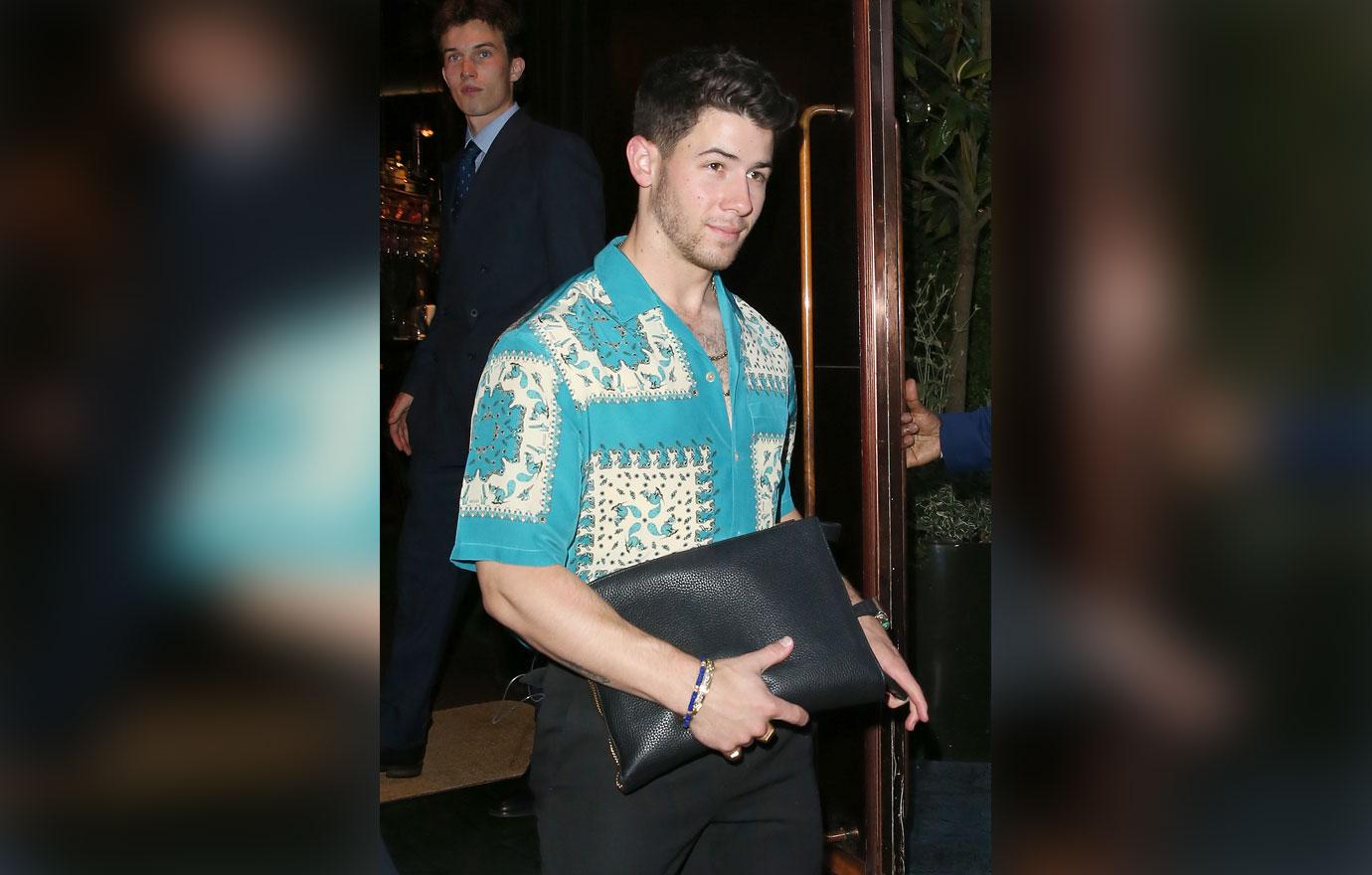 nick jonas leaving restaurant in london