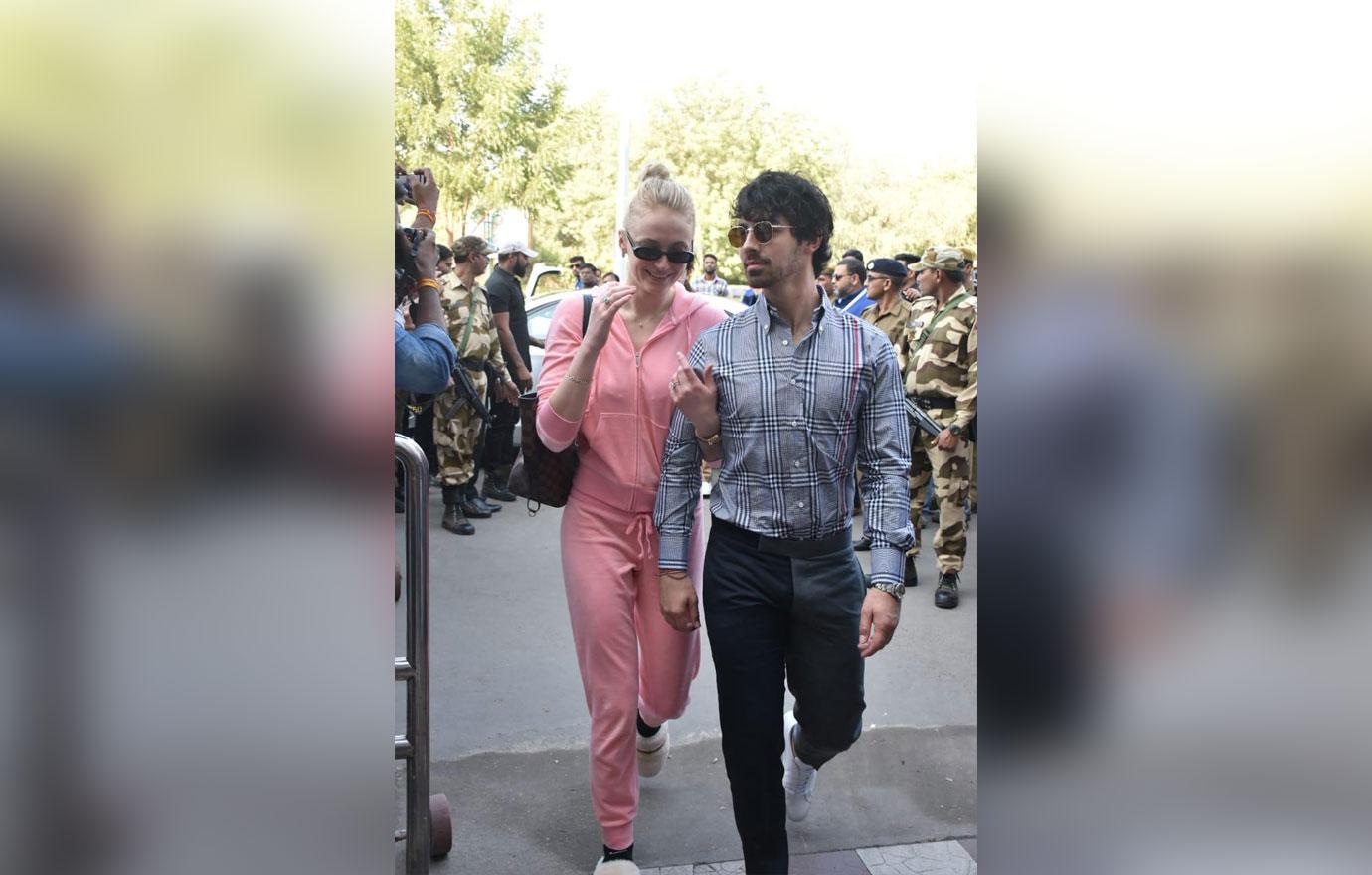 Sophie Turner dressed in a pink tracksuit and fluffy slippers seen at Jodhpur airport after her fiancé Joe&#8217;s brother Nick Jonas got married to  Priyanka Chopra