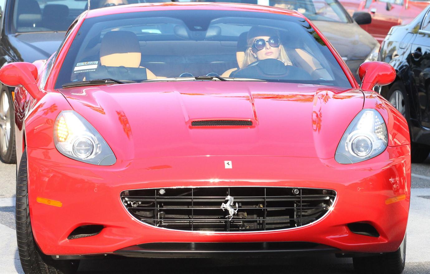 Paris Hilton was seen driving her red Ferrari California in … California.