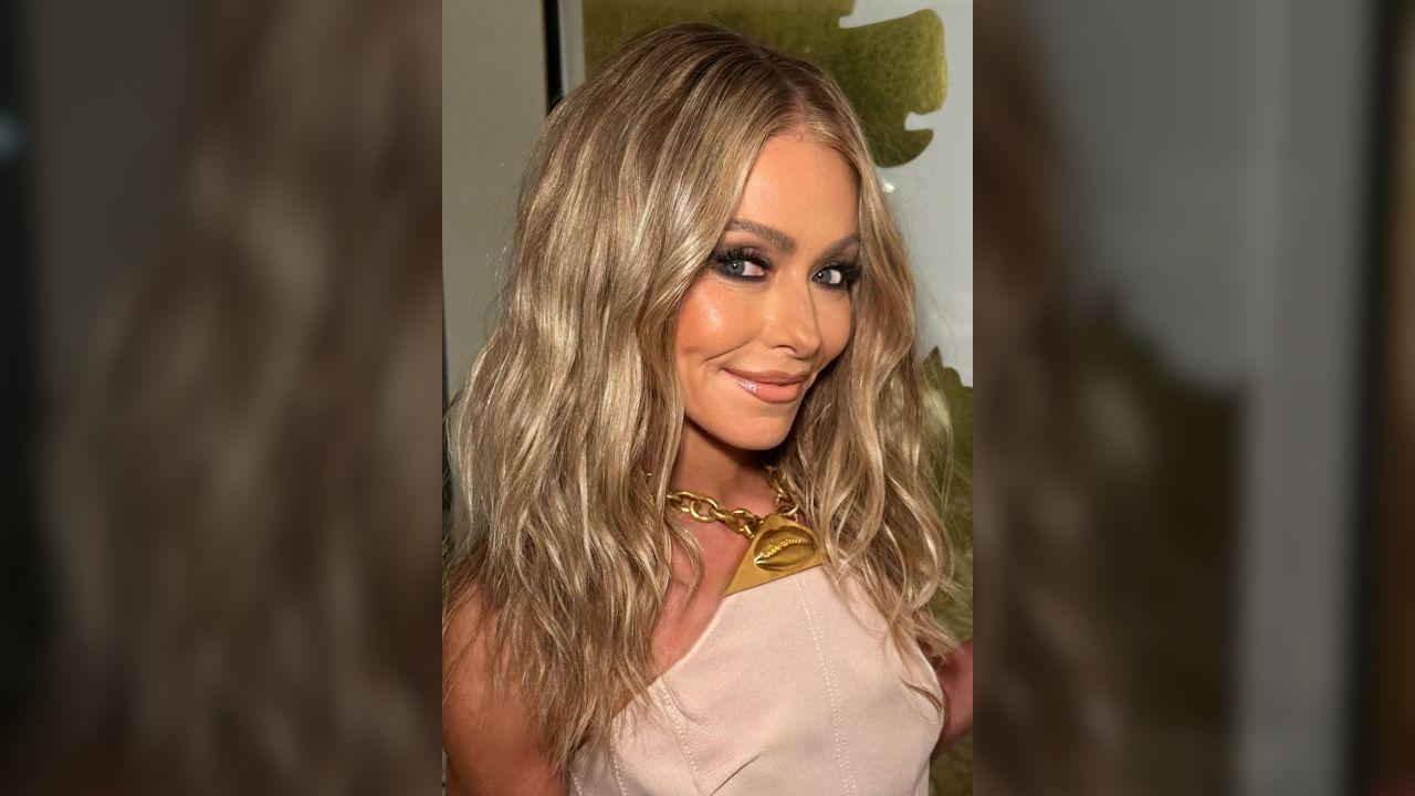 Photo of Kelly Ripa's hair takes ages.