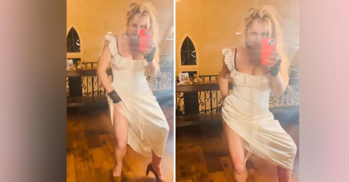 Photo of Britney Spears pulled up her long dress to show off her legs in a new Instagram video.
