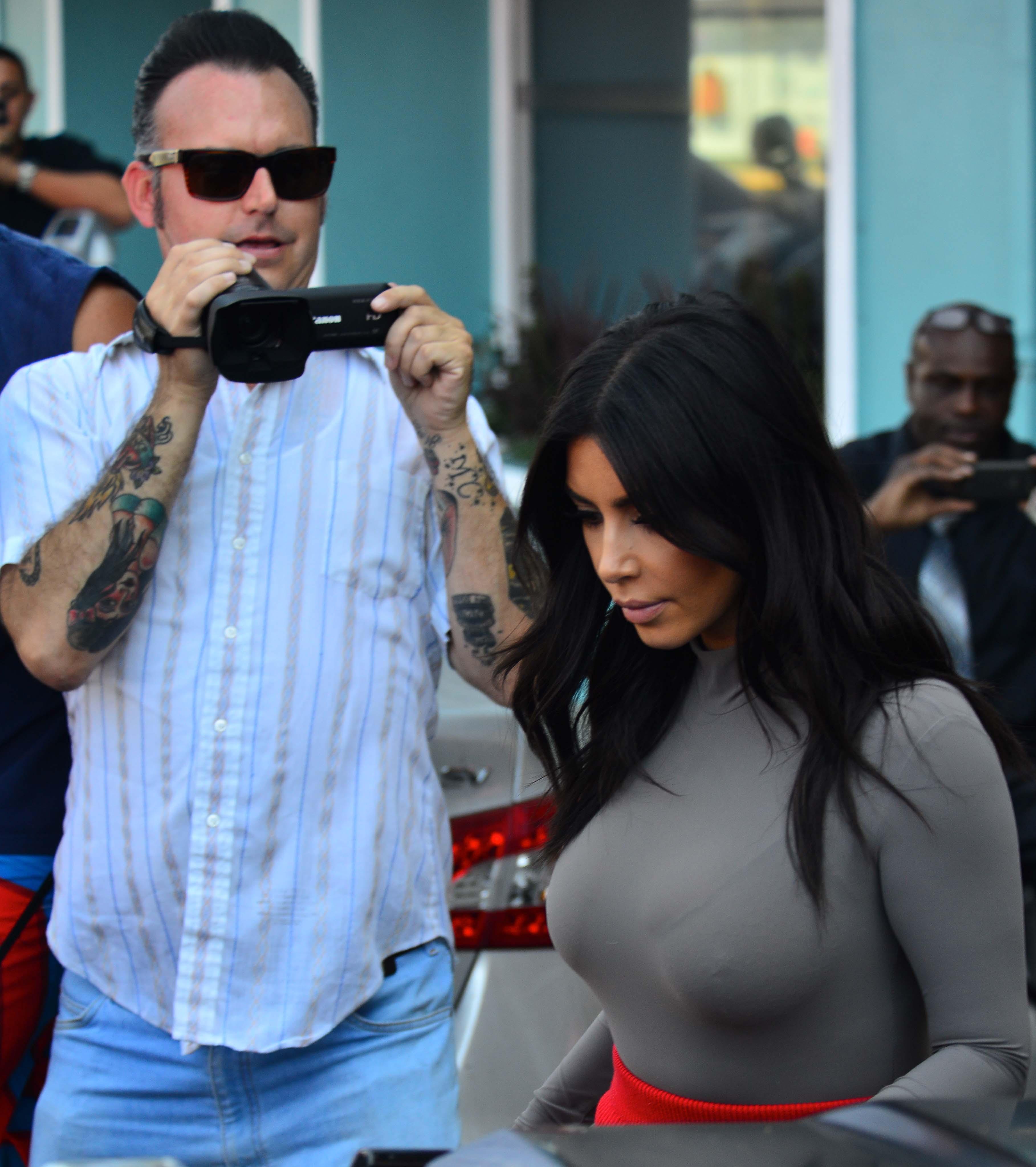 Kim Kardashian is spotted as she spends the afternoon running around West Hollywood, CA, having lunch and shopping with a girlfriend before meeting up with her stepdad Bruce Jenner