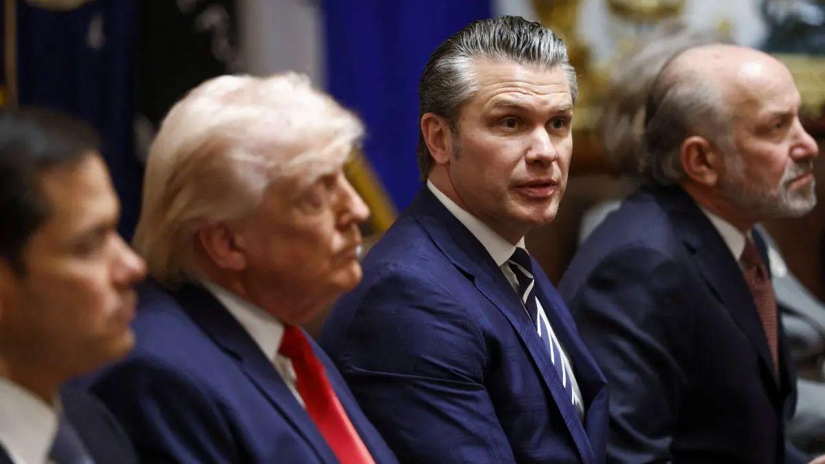 Photo of White House Press Secretary Karoline Leavitt blamed handshaking for the president's constant bruising on his hand. 