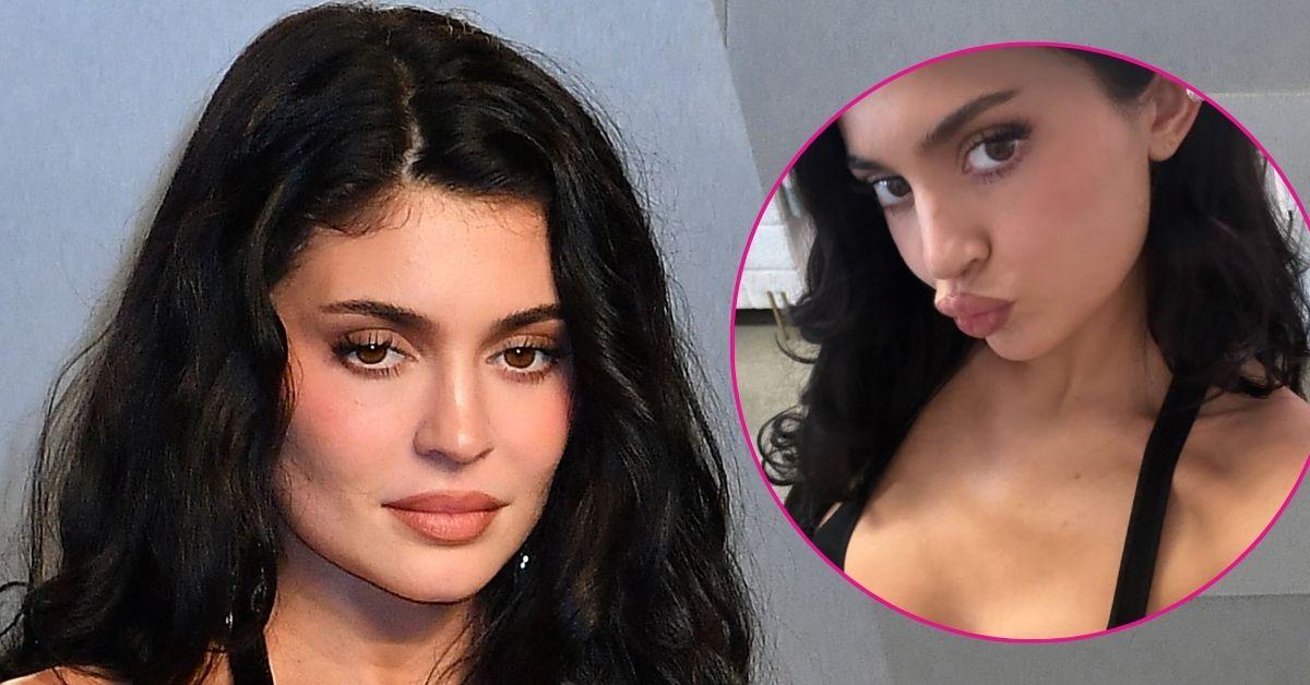kylie jenner low cut black top photos