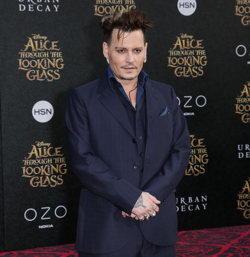 Johnny Depp arrives solo at Disney&#8217;s &#8216;Alice Through The Looking Glass&#8217; Los Angeles premiere