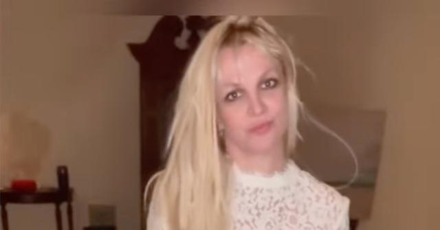 britney spears timeless meaning strange video outfit