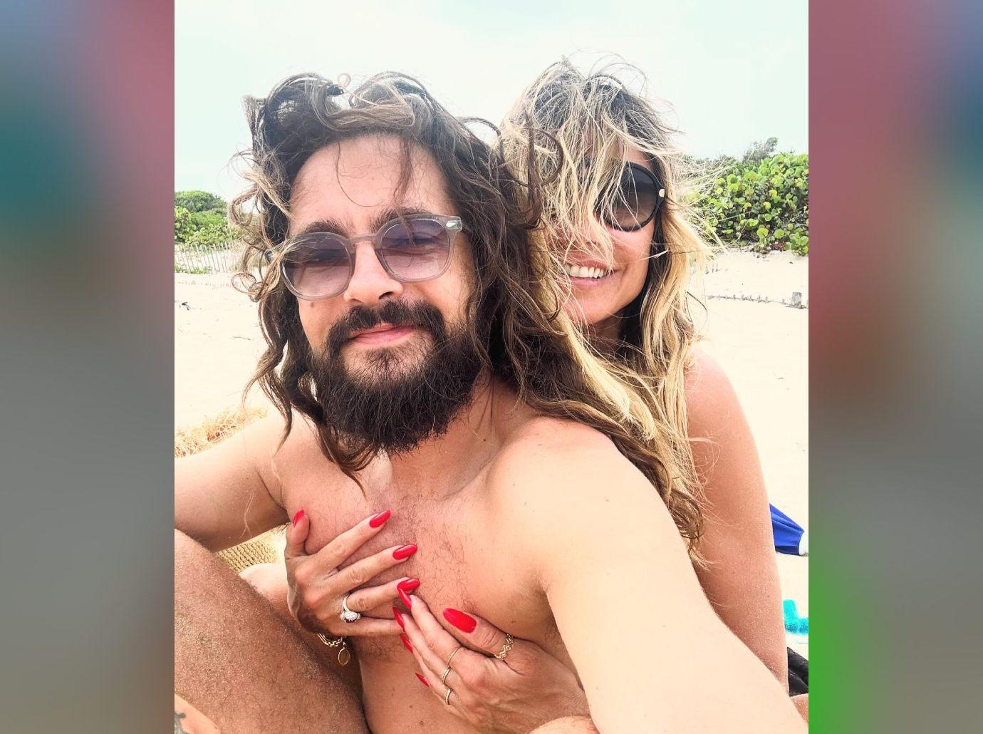 heidi klum sunbathes topless husband tom kaulitz celebrating anniversary photos