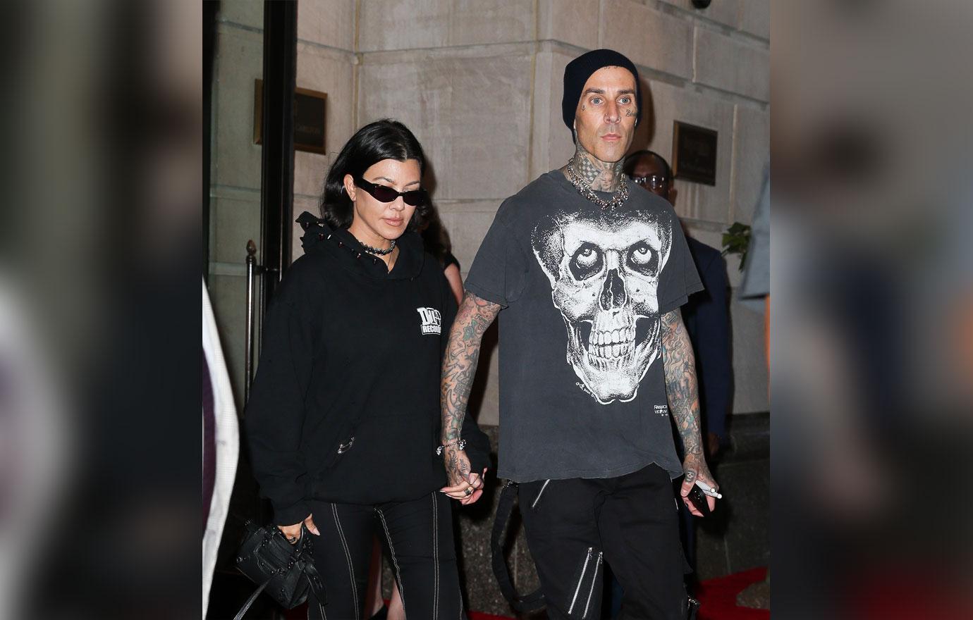 travis barker covers up shanna moakler name tattoo fiancee kourtney kardashian lips