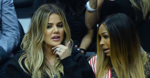 Khloe Kardashian cheers on Tristan Thompson as she sports a ring next to BFF Malika Haqq