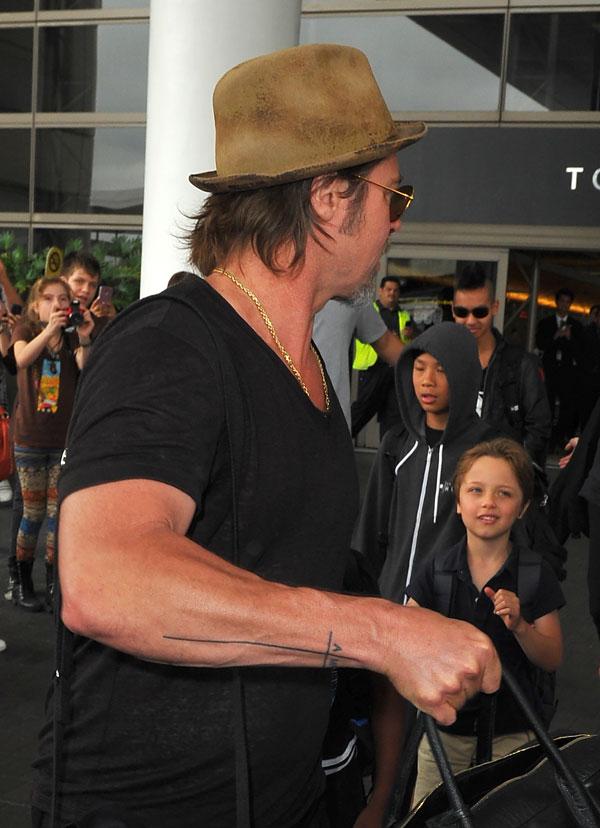 Brad Pitt flashes new tattoo dedicated to wife Angelina wife and their  children  Daily Mail Online