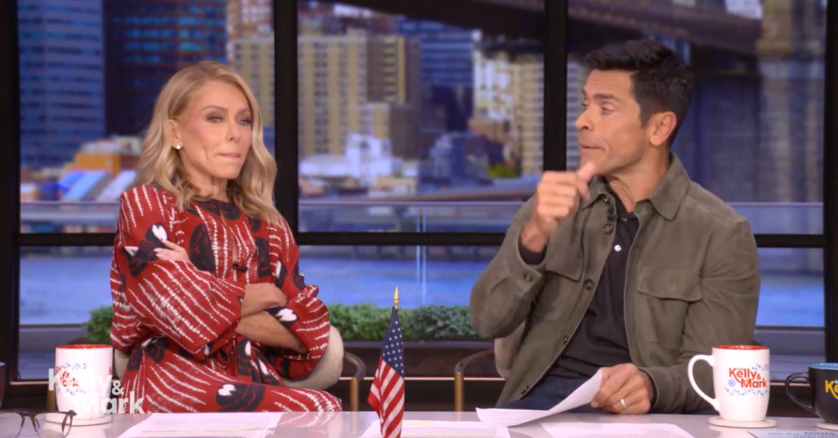 Image of Mark Consuelos wastes no time getting off of a plane after landing.