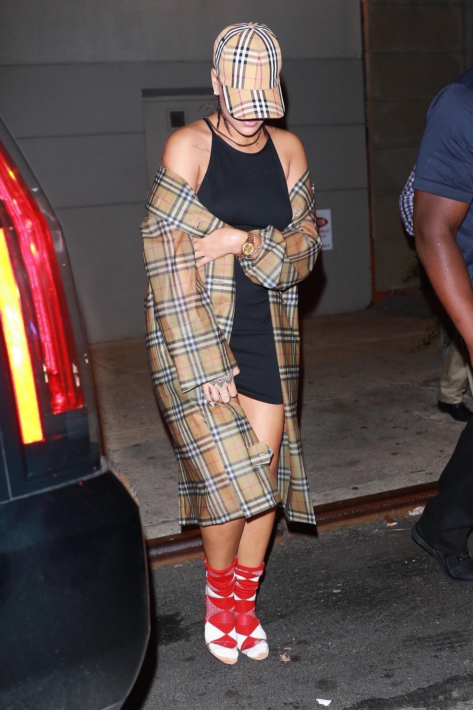 *EXCLUSIVE* Rihanna decks herself in Burberry for dinner in the Big Apple