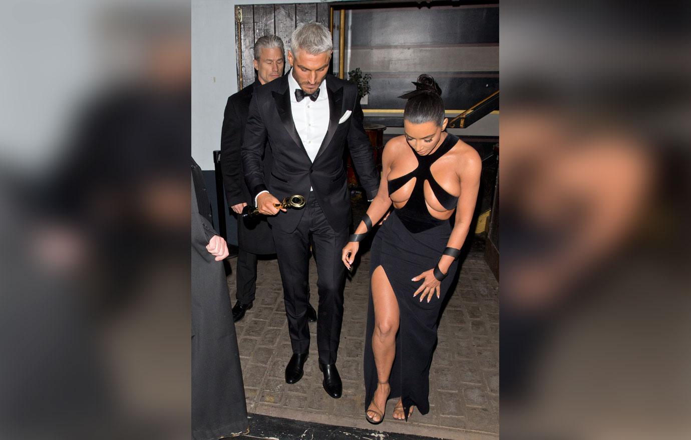 Kim Kardashian wears a &#8216;Barely There&#8217; dress as she was seen leaving  &#8216;The Avalon&#8217; in Hollywood with her British Hair Stylist Chris Appleton who was looking sharp in a Tuxedo and holding a Gold award