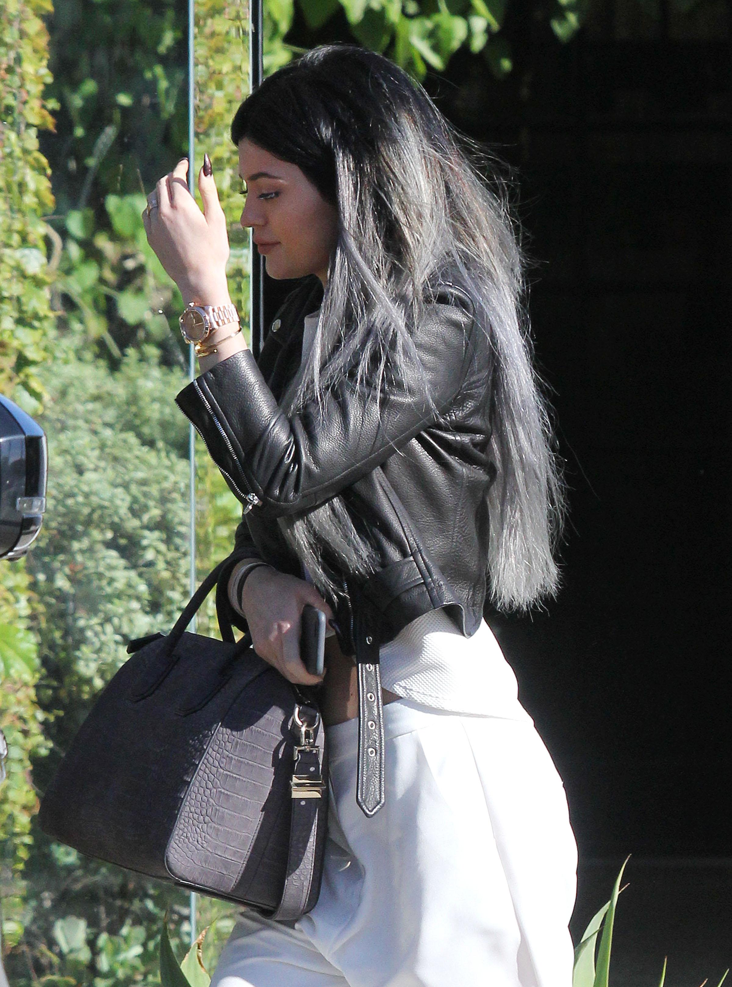 Kylie Jenner showing off her new extensions while leaving Andy LeCompte Salon **NO DAILY MAIL SALES**
