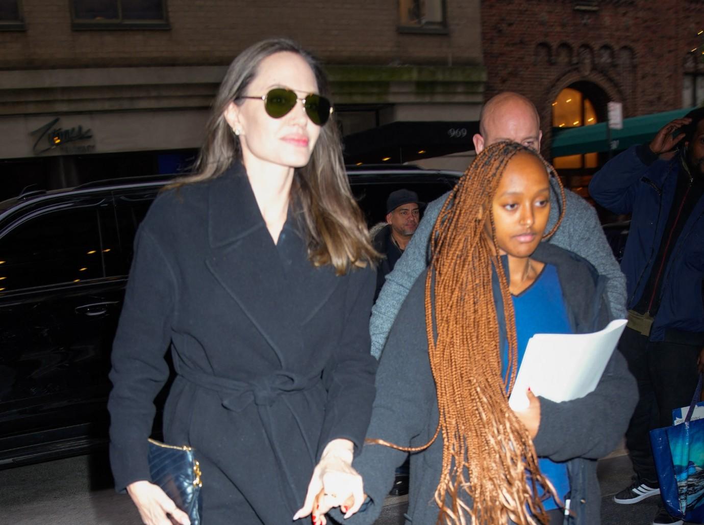 Angelina Jolie's daughter Zahara, 18, is nearly as tall as her famous mom  in rare sighting of duo at NYC airport