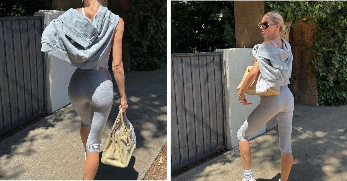 image of The model's outfit consisted of a Birkin bag, Alo sneakers and oversized sunglasses.