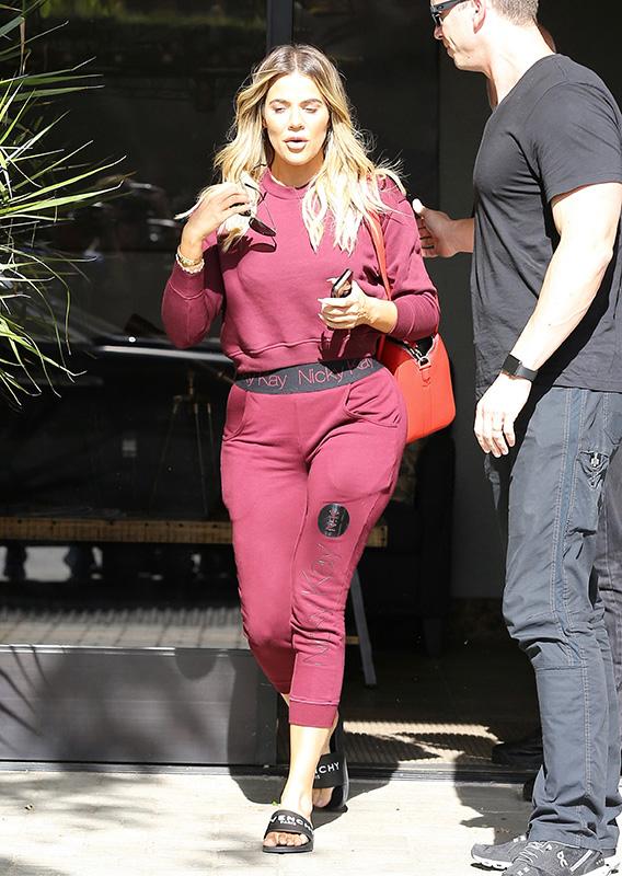 Shy Khloe Kardashian Stops By A Studio