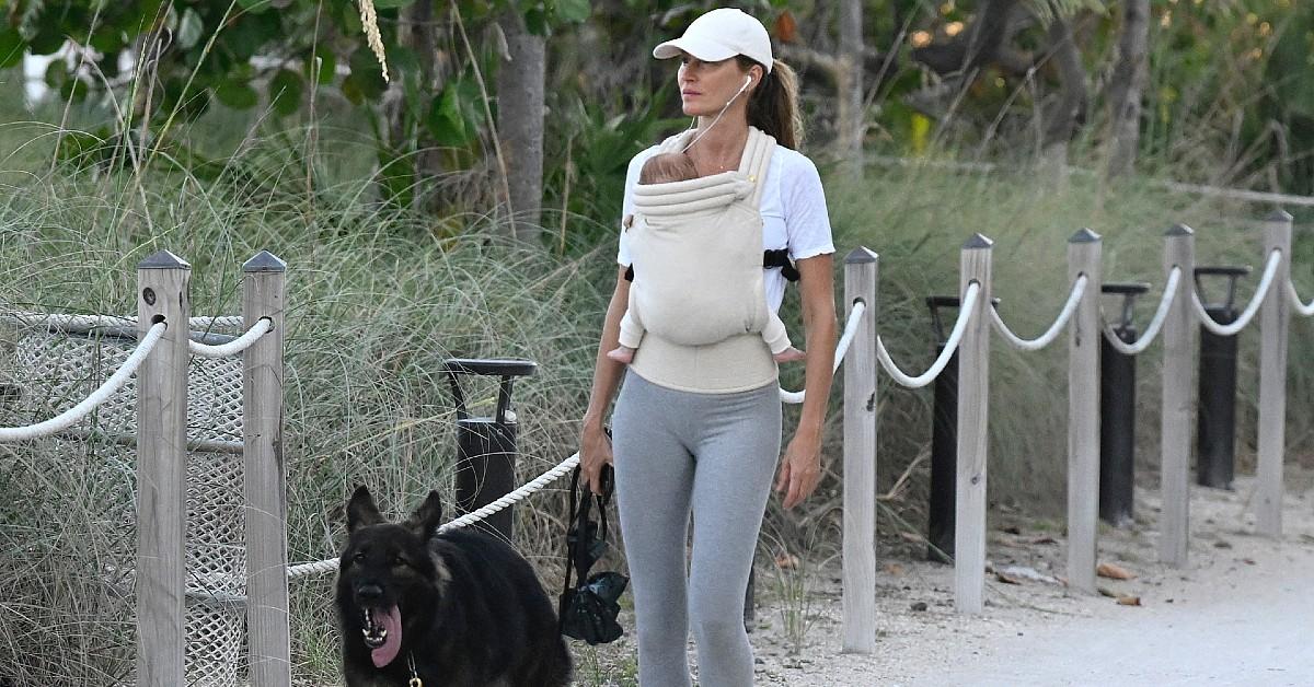 gisele walks baby and dog in miami