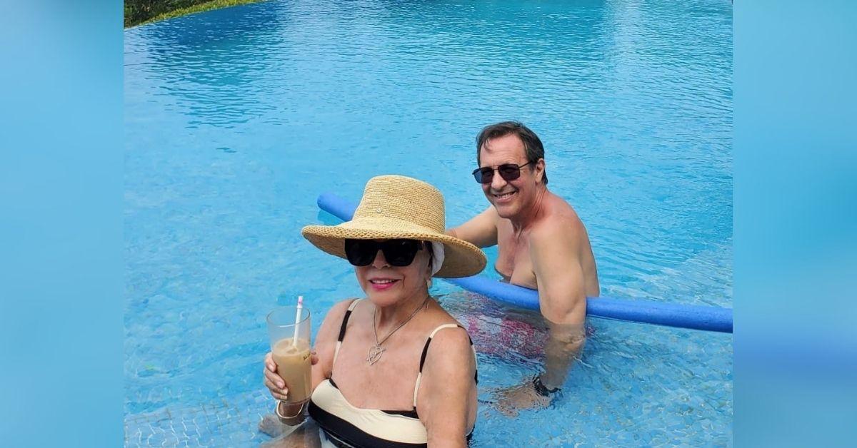 image of Joan Collins shared stunning vacation photos from St. Tropez, including pictures of herself wearing a stylish one-piece swimsuit.