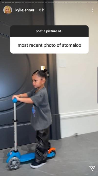 Kylie Jenner's daughter Stormi on a scooter.