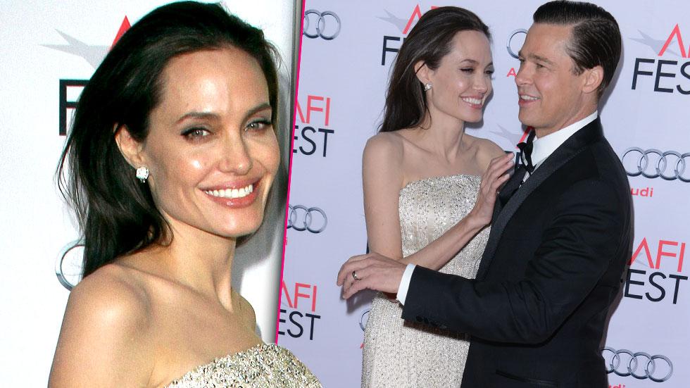 Angelina Jolie Flaunts Busty Breasts On Red Carpet With Brad Pitt ...
