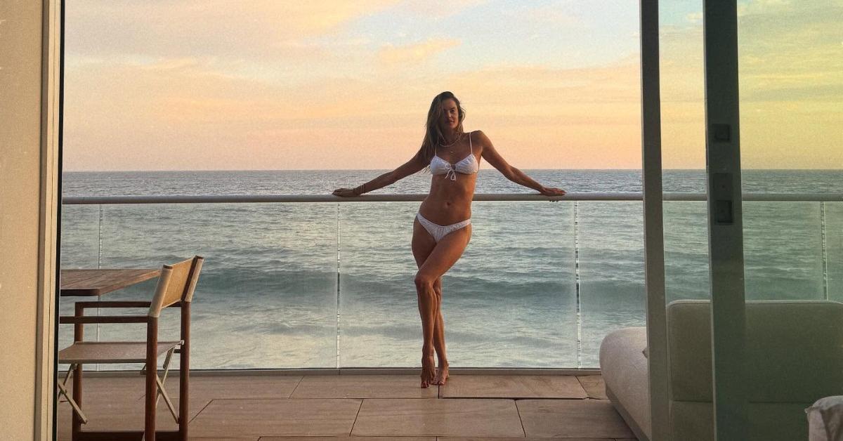 Image of Alessandra Ambrosio served looks in a white bikini set.