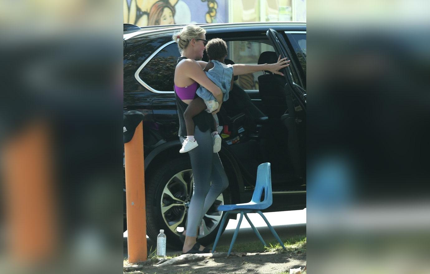 Charlize Theron Daughter Cute Pics 06