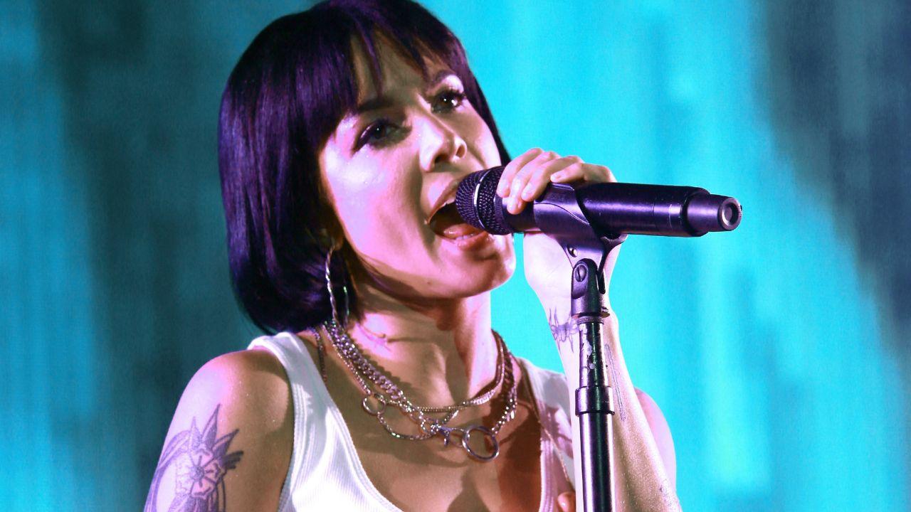Image of Halsey styled her hair in dark brown pixie cut and boho braids earlier this year.