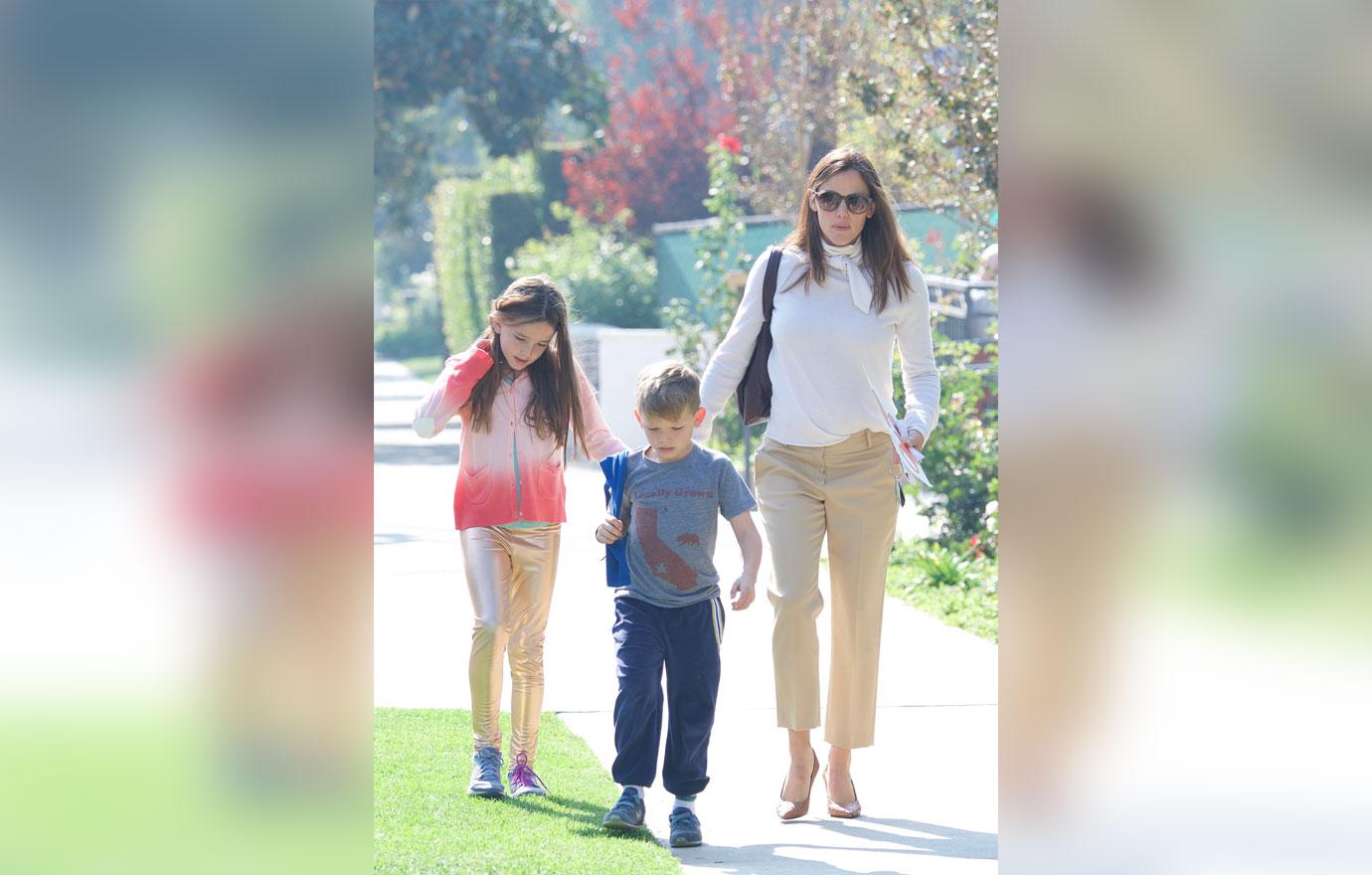 Jennifer Garner leaving the church with her kids.