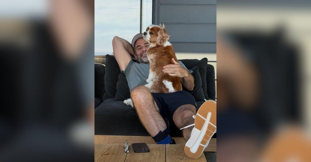 image of Jim Curtis was seen cuddling up to her dog in one snap. 