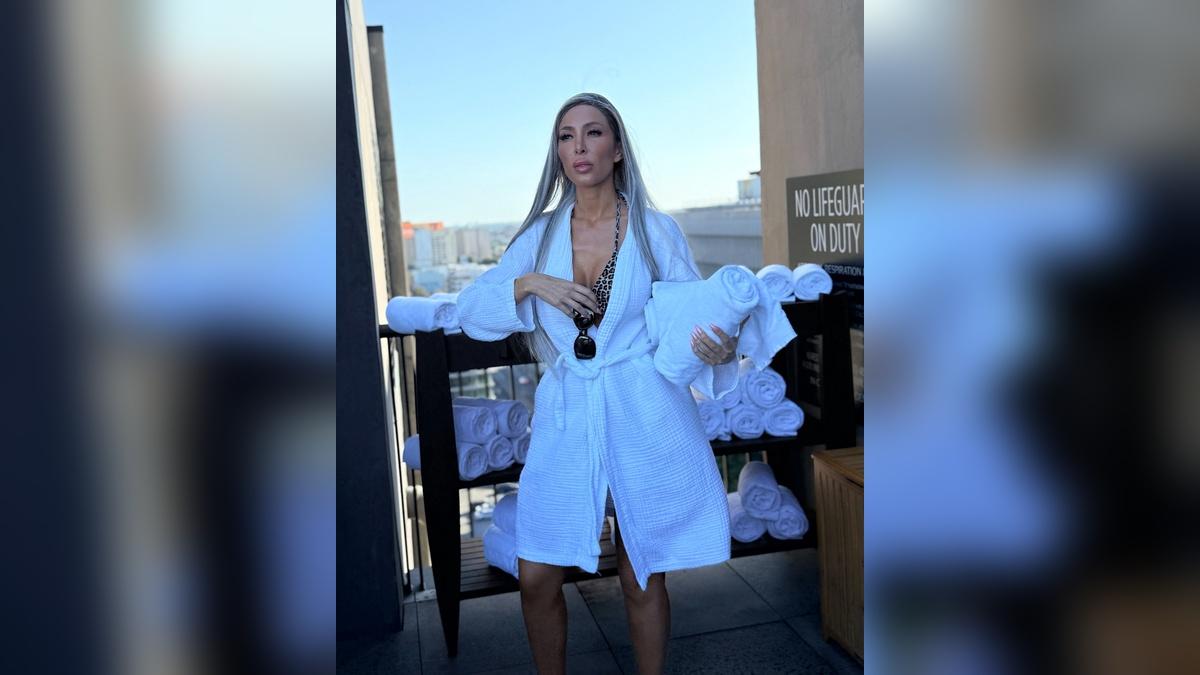 image of Farrah Abraham showed off her toned figure in a revealing printed bikini during a sunny poolside getaway.