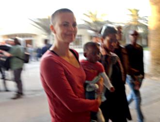 Charlize theron june28 shaved head jackson.jpg