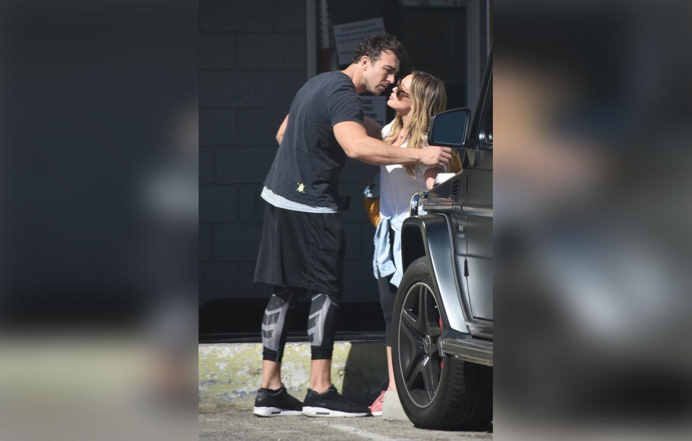 *EXCLUSIVE* Hilary Duff is all smiles as she heads to the gym with her trainer