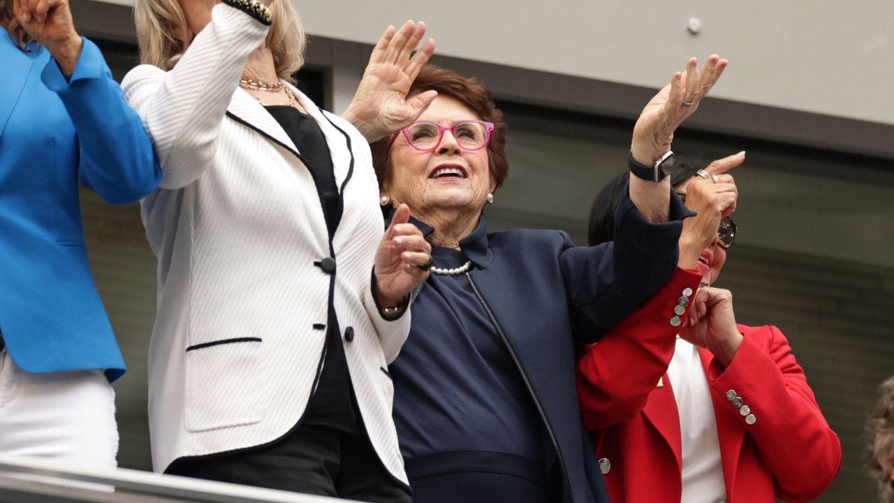 Image of Tennis legend Billie Jean King enthusiastically cheered from the stands during the U.S. Open women's final.