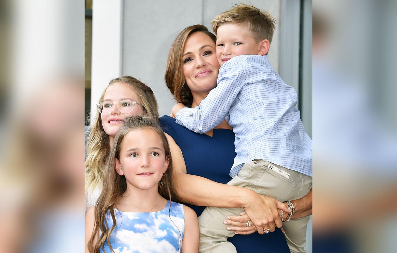 Jennifer Garner poses with her children Violet Affleck, Seraphina Rose Elizabeth Affleck and Samuel Garner Affleck at her star on the Hollywood Walk of Fame, August 20, 2018 in Hollywood, California. - Garner, who received the 2,641st star in the Motion Picture category, stars in the soon to be released film "Peppermint."