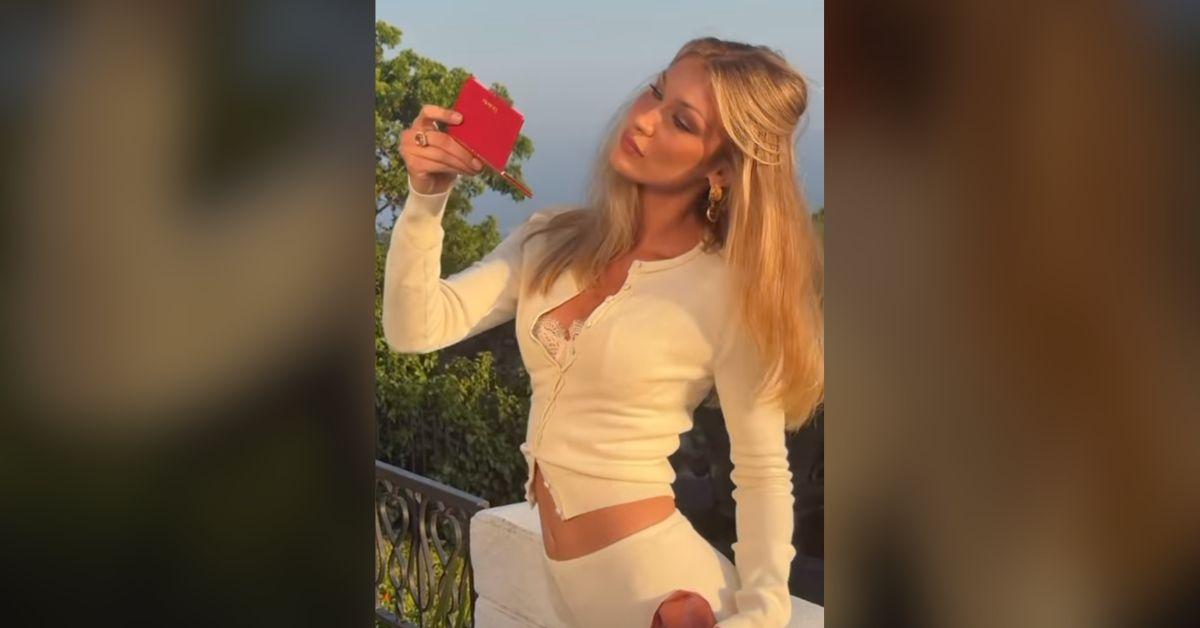 Image of Bella Hadid showed off her tiny waist while posing on a balcony.