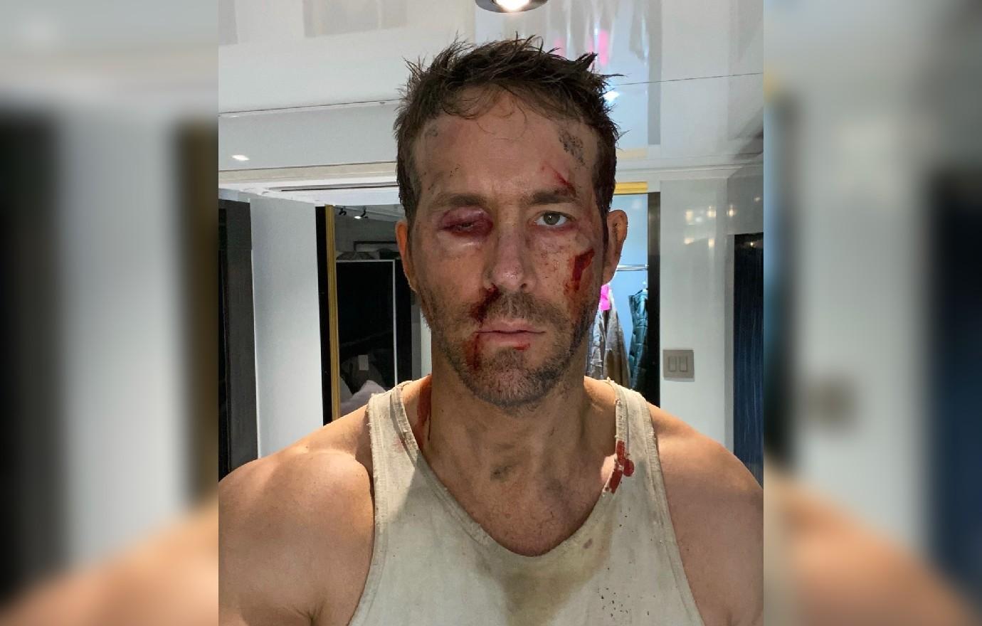 ryan reynolds shocks fans gory photo holding bird snake