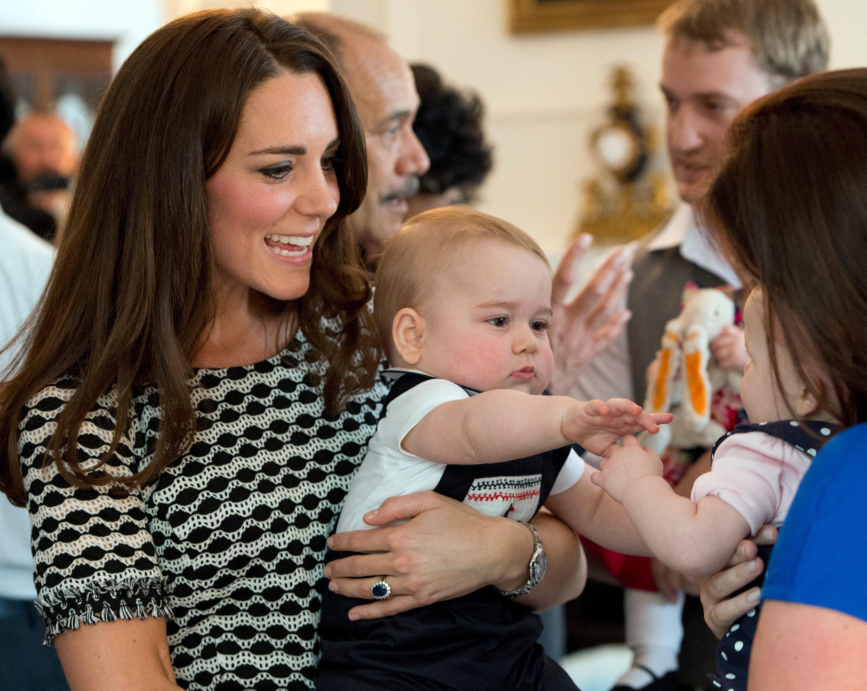 The Duke and Duchess of Cambridge and Prince George attend a Plunket event