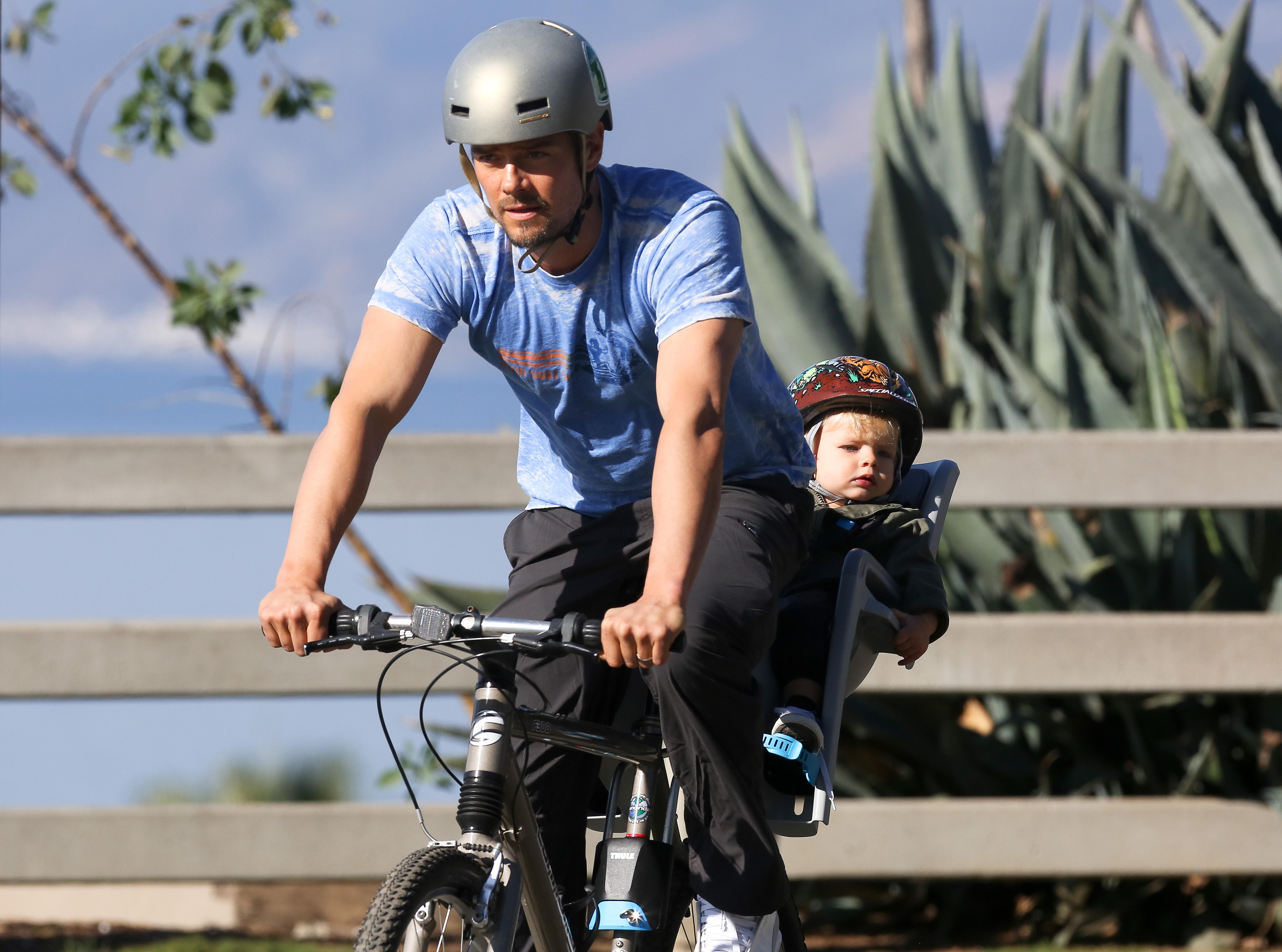 Josh Duhamel takes baby Axl bike riding in Santa Monica