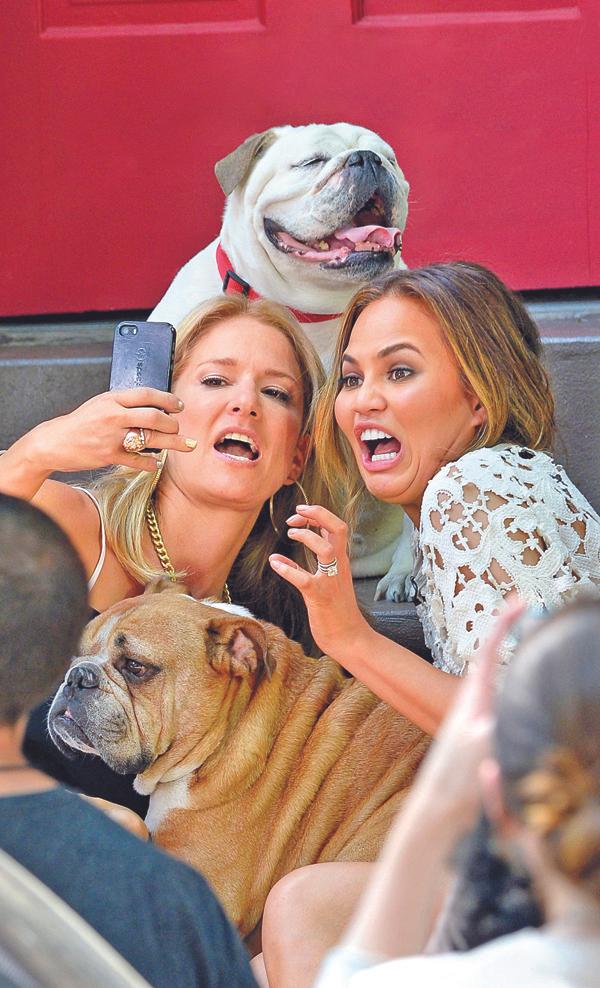 Chrissy Teigen and her dog Puddy taped an episode of NBC&#8217;s &#8216;Talk Stoop with Cat Greenleaf&#8217; in Brooklyn