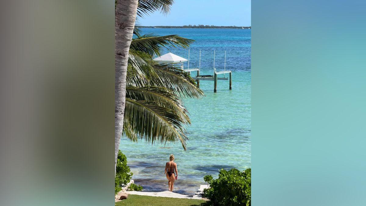Image of Megan Moroney was all smiles lounging by the water with her girlfriends.