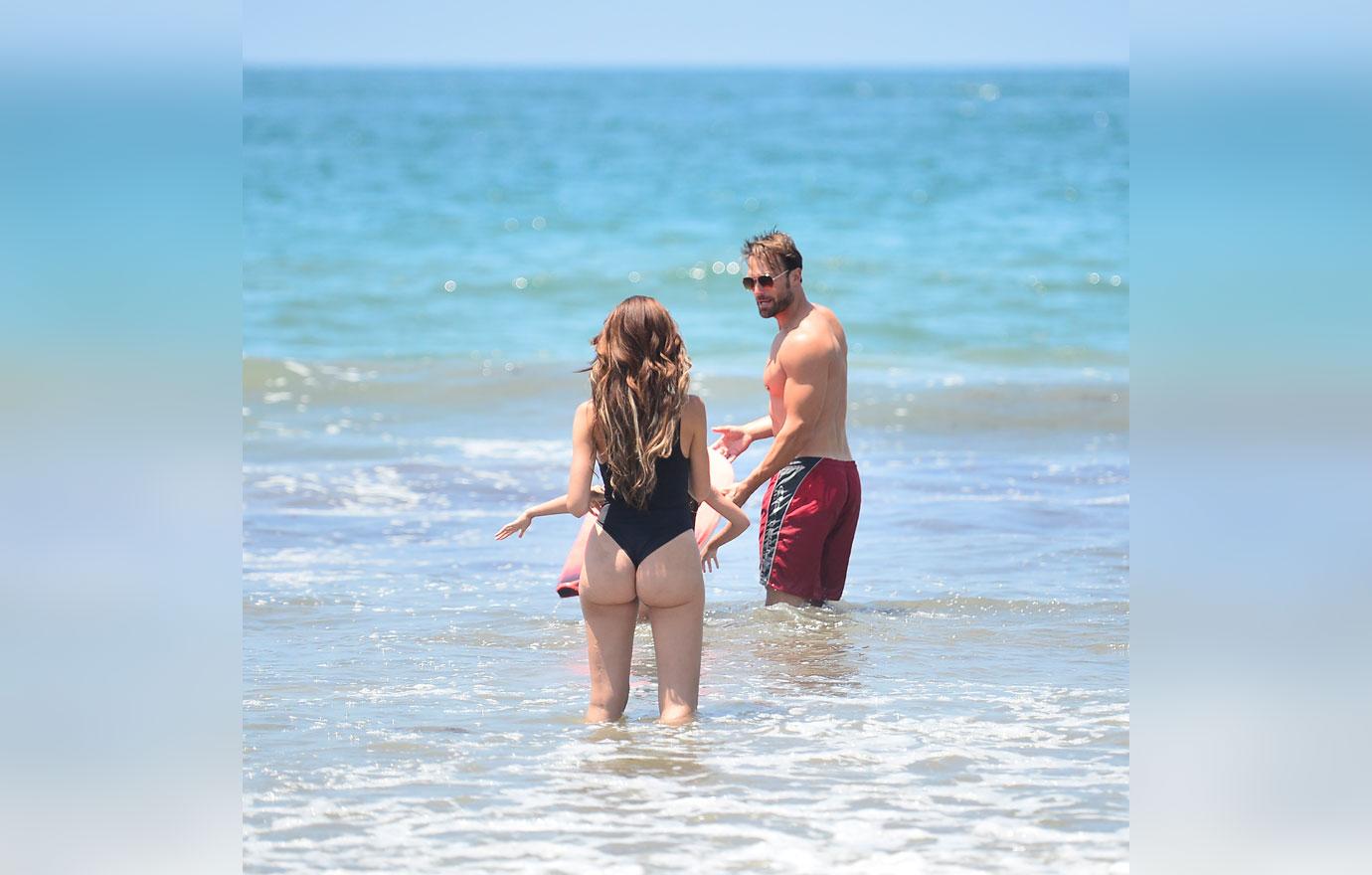 EXCLUSIVE: Farrah Abraham gets cozy with German playboy Bastian Yotta at the beach!